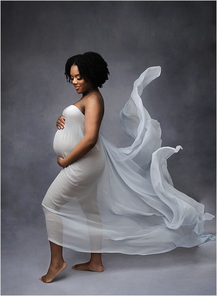 Atlanta maternity photography wearing flowy fabric