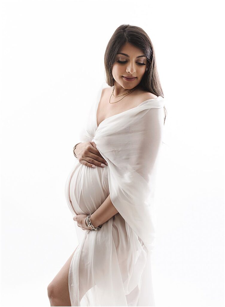 Maternity back lit image, using white fabric