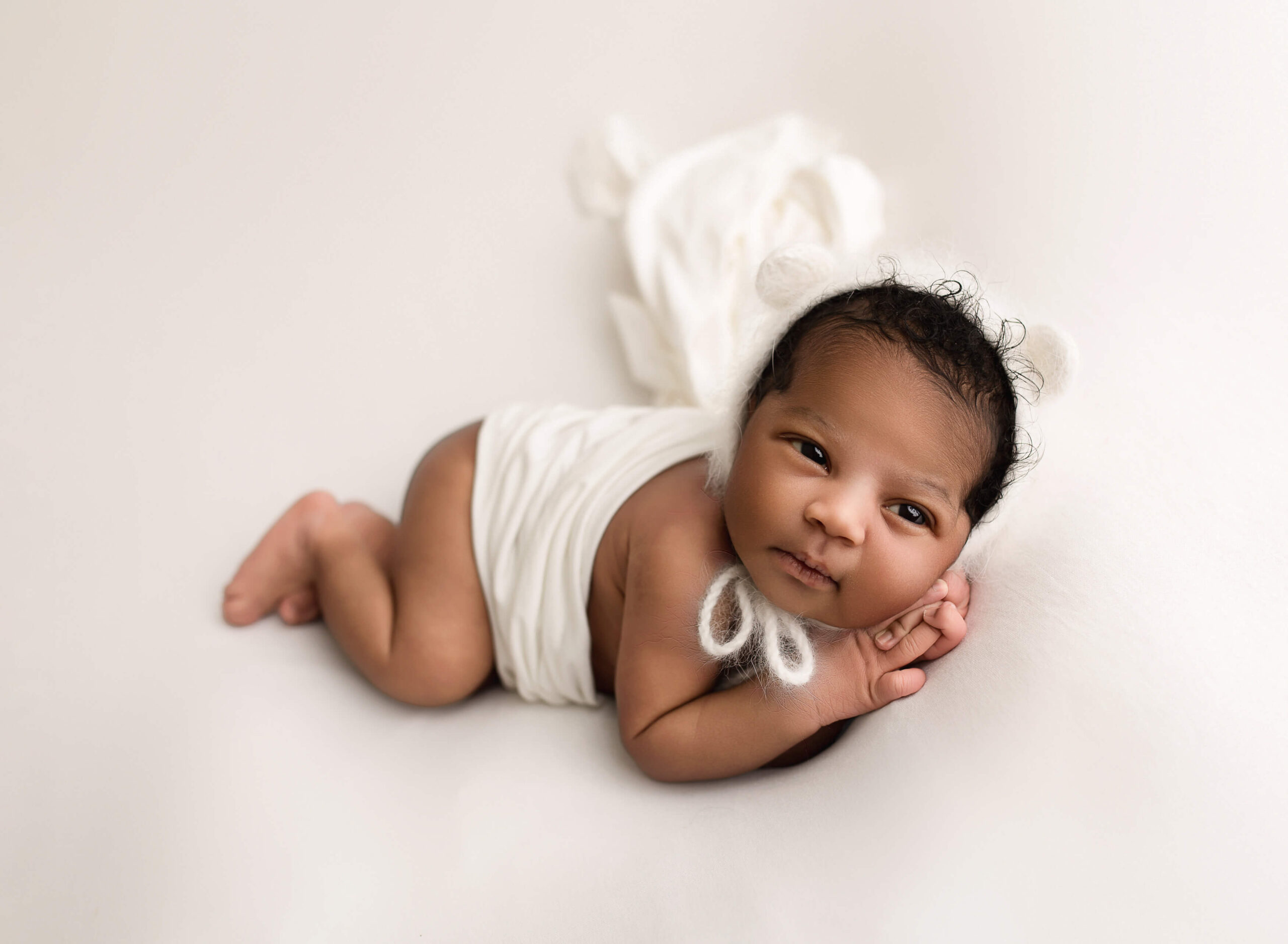 baby girl on white background taken in studio in Atlanta