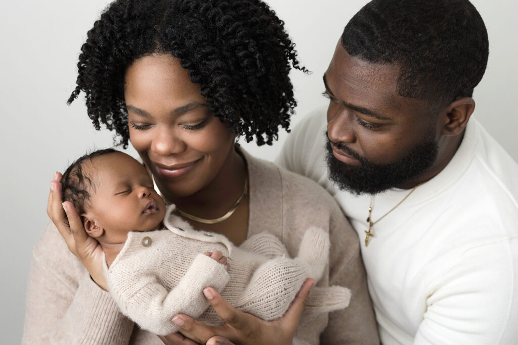 brand new family holding newborn boy in Atlanta 